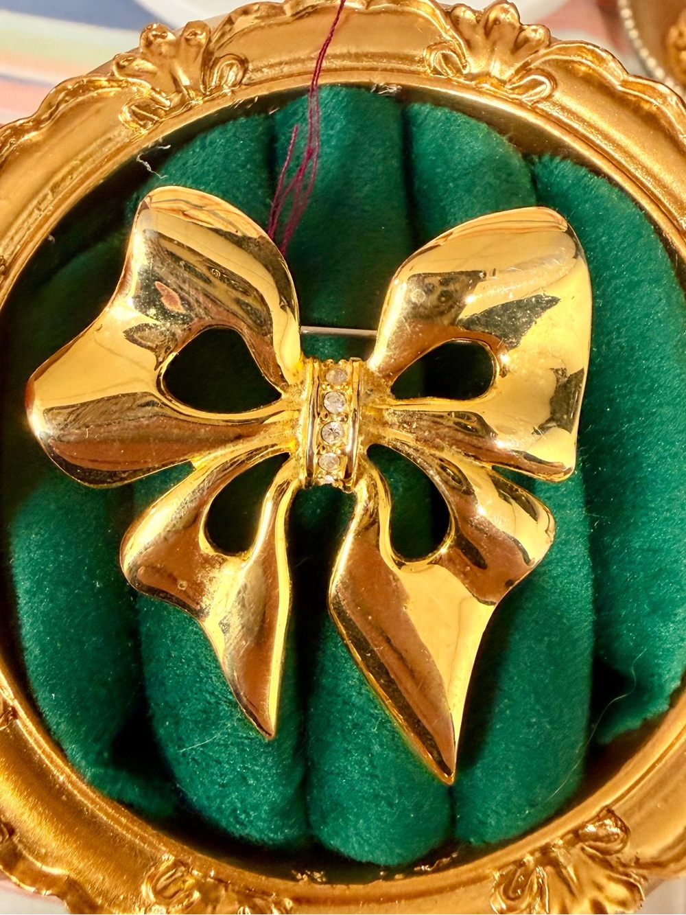 Gold Bow Brooch with Crystal Accents